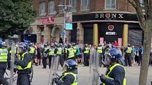UK riots live: Far-right mob set fire to Rotherham migrant hotel after windows smashed and police attacked