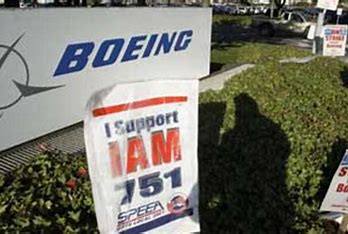 Boeing says it has a deal to avoid a strike by more than 30,000 machinists