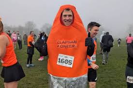 Runner aims to break record for fastest London Marathon run in traffic cone suit in 2025.